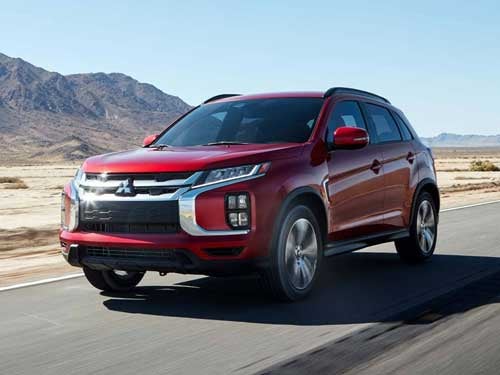 2023 Mitsubishi Outlander Sport driving down a Texas road